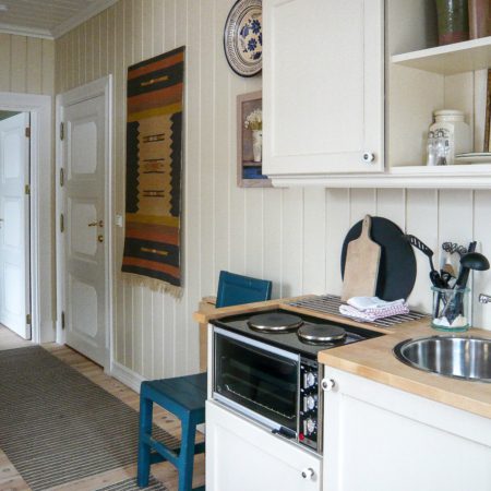 Bilde av kjøkken, gang i Nystugu på Hagaled Gjestegård.